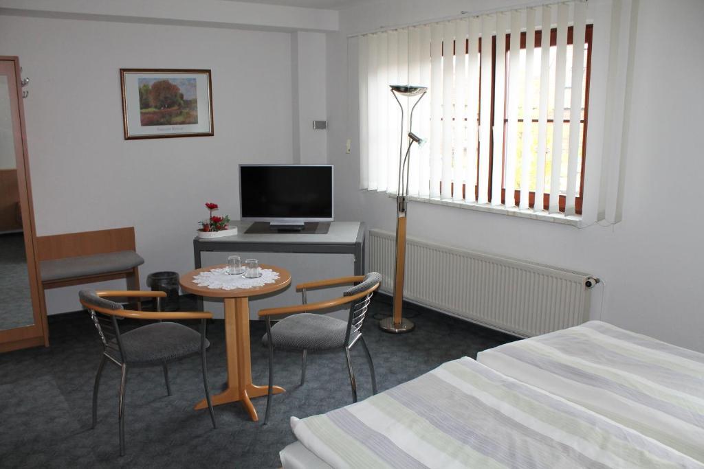 Hotel Am Stadtwall Кведлинбург Номер фото